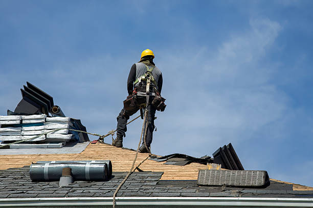 Professional Roof Replacement technician working in Lewistown, IL